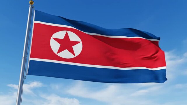 North Korea flag waving on flagpole against blue sky