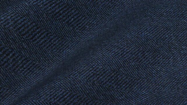 Navy Blue Herringbone Tweed Fabric shifting in elegant dark waves of traditional zigzag pattern and thick rustic wool material for tailored jackets
