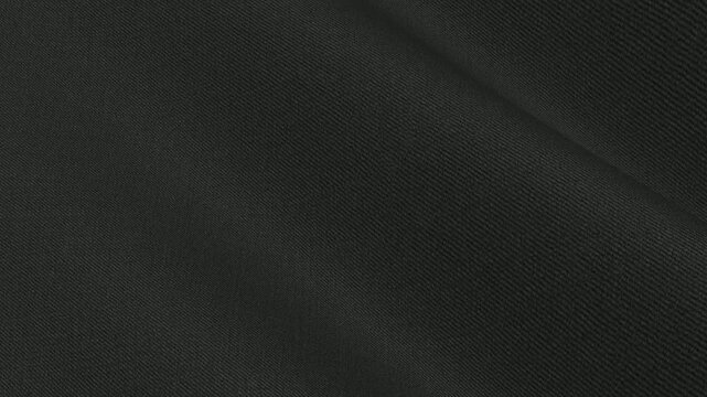 Solid Black Stretch Wool Twill Fabric rippling in sleek matte waves of premium flexible executive suiting texture for timeless formal garments