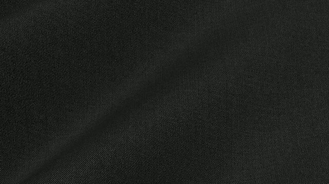 Premium Black Wool Gabardine Fabric cascading in sleek pristine waves of dense diagonal weave and smooth matte surface for luxury tailor coats