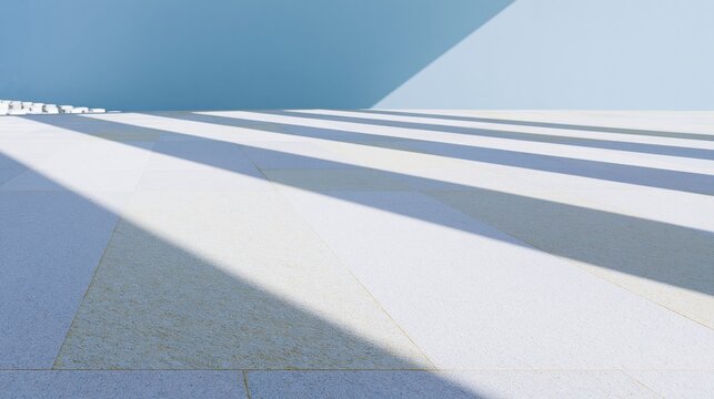 Smooth stone platform under diffused bands of light with a cool blue sky, conveying a solemn memorial atmosphere for quiet reflection and background use
