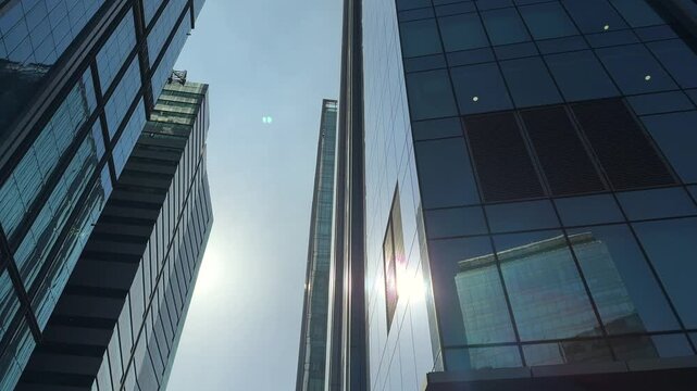 Glass Skyscrapers from Below. Worm Eye Cinematic View of Urban Architecture