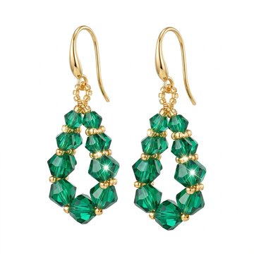 Elegant pair of dangle earrings made of faceted emerald green crystal beads and gold hardware isolated on a white background
