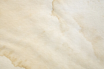 Obraz premium Old vintage paper texture background with aged stains and antique yellowed parchment effect