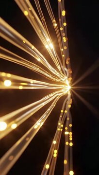 Golden fiber optic lines converging into bright digital light point