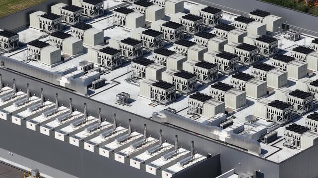 Aerial drone view of a data center supporting big data, machine learning, AI infrastructure, cloud computing and digital storage.