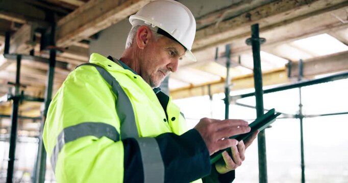 Mature, man and architect with tablet on construction site for scaffolding safety or security. Male person, contractor or civil engineer with technology for building inspection, PPE or architecture