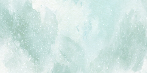 Soft mint green watercolor background with white specks and subtle texture for design and artistic projects © Namira