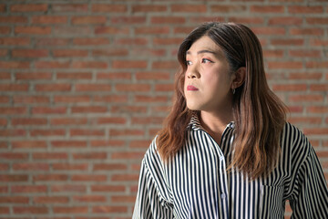 Thai Isan transgender businesswoman profile portrait indoors © Ranta Images