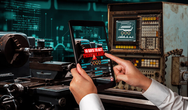 Engineer use augmented reality software in smart factory production line with automated application. Futuristic machinery in working in concept of Industry 4.0 or 4th industrial revolution.