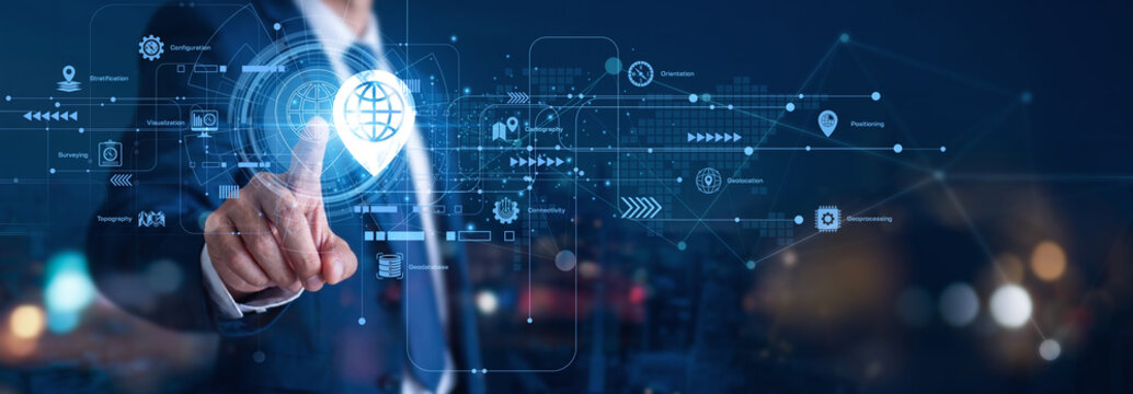 GIS maps complex spatial geographic information. A local surveyor hand touch GIS icon to analyze terrain. This global network model is a precise mapping and location concept for planning.