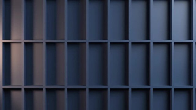 Shelving unit consists of a geometric grid of dark rectangular compartments against a solid background.