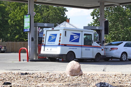 USPS Truck at a Gas Station