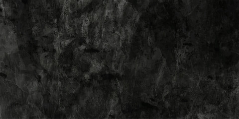 Obraz premium A dark, textured background resembling rough stone or concrete, evoking a sense of raw, industrial, or weathered material.