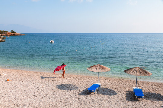 Woman with a sarong on the beach, Zakynthos, Greek Islands, Greece