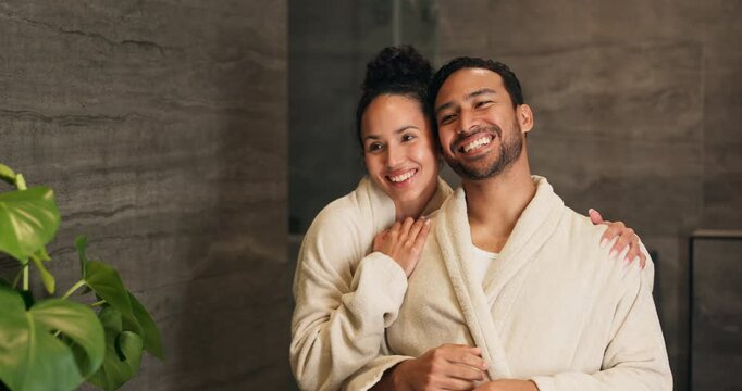 Hug, mirror and morning routine with couple in bathroom of home together for bonding or love. Grooming, hygiene and reflection with happy people in apartment for connection, security or trust