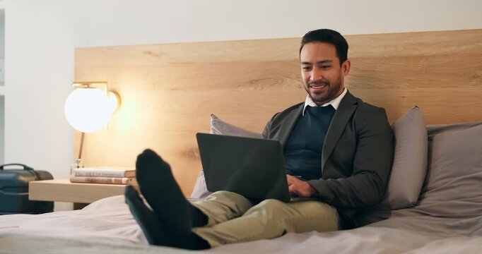 Businessman, relax and typing with laptop in bedroom for remote work, schedule or communication. Man, freelancer or smile with computer in bed for online network, internet or connection in home