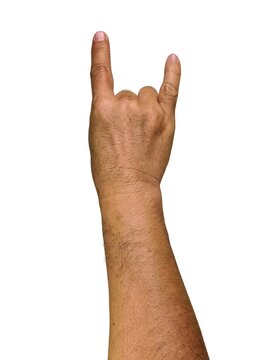Man's hand gesturing rock and roll, heavy metal, devil horns gesture or I love you on white background.