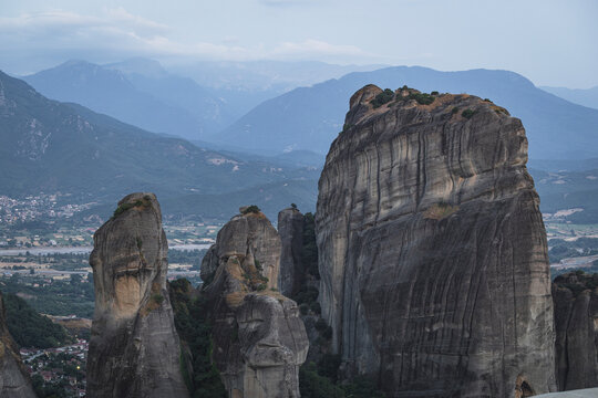 Dramatic rock pillars of Meteora Greece at dusk