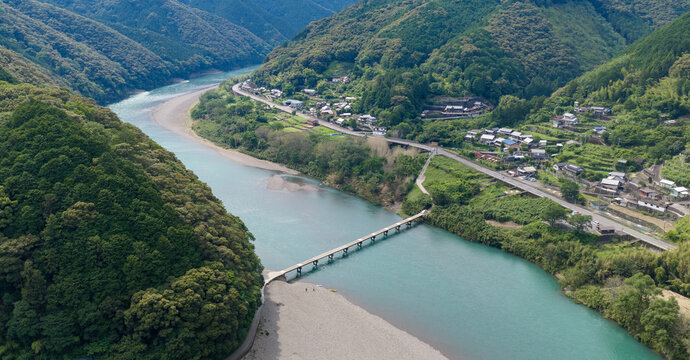 Aerial View of Iwama Chinka Bridge and Riverside Village on the Shimanto River