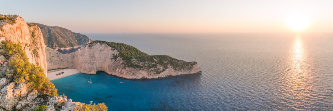Colourful sunset over famous Navagio shipwreck beach, Zakynthos, Greek Islands, Greece
