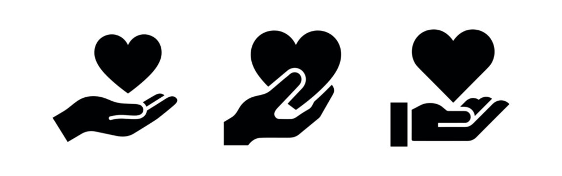 Hand holding heart icons set, love, care, giving and donation symbols.