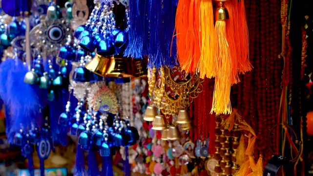 Colorful and vibrant items with spiritual threads and prayer beads at Kamakhya Temple market place