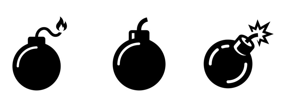 Classic cartoon bomb icons set with lit fuse and explosion, black vector illustration.