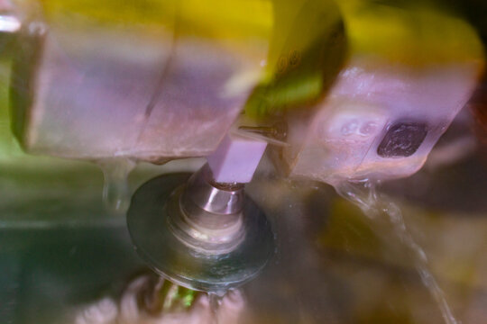 Dental Drill Handpiece Operating on Tooth During Procedure