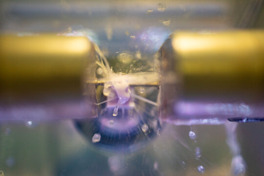 Extreme Macro View of Dental Drill Burr with Water Spray