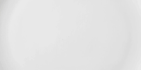 A white plate with a subtle texture sits empty, ready to be filled with culinary creations, its minimalist design inviting creativity and appetite. © RD Visuals
