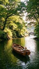 Fototapeta premium Wooden Rowboat on Calm River Amidst Lush Green Forest and Stone Bridge