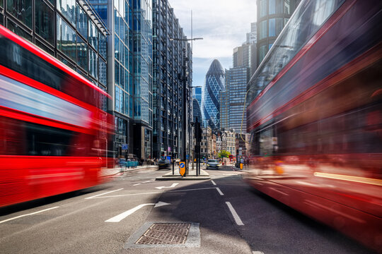 Long exposure view of Liverpool Street area in the City of London, England, with bus traffic and office skyscrapers in the background