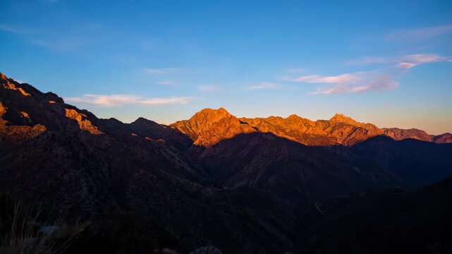 Mountains sunset natural scenery, golden mountaintops sunrise delayed