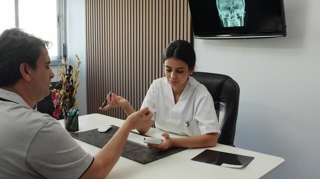 Nurse performing diabetes blood sugar test on patient