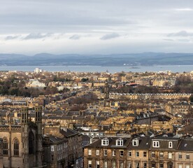 Fototapeta premium Beautiful aerial view of Greenock's waterfront in Scotland, showcasing charming residential neighborhoods