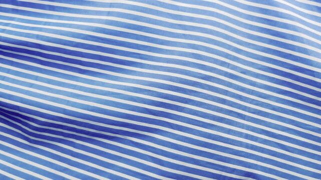 striped cotton fabric ripples gently as neon pink blue violet red and white illumination transforms the textile pattern