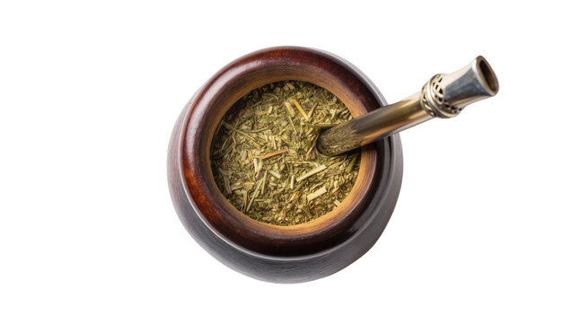 Wooden mate gourd with yerba mate and bombilla