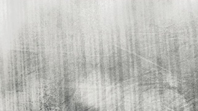 white cotton fabric swaying gently in soft studio light creating subtle shadows during macro tracking shot