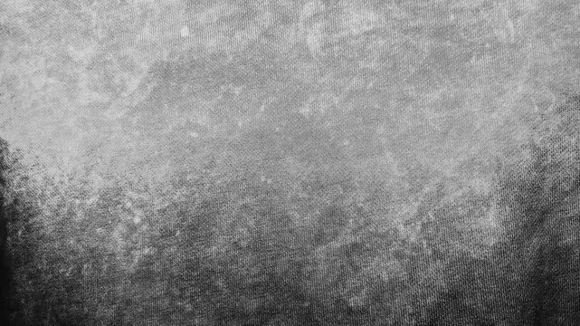 cinematic macro panning shot of textured denim fabric morphing under dramatic moody abstract lighting