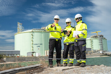 Fototapeta premium Safety training for oil and gas workers lng facility professional photo industrial environment team collaboration