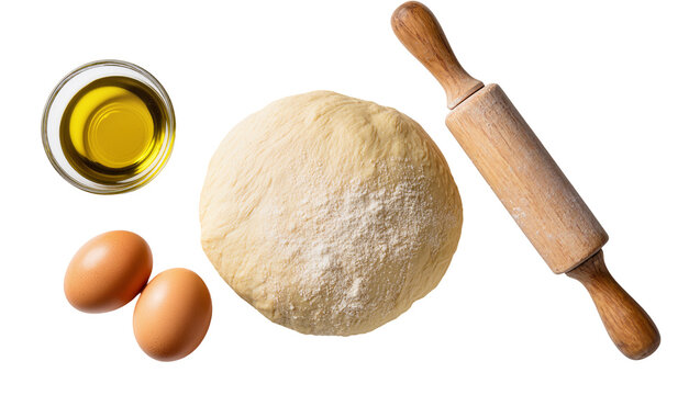 Raw dough ball with eggs olive oil, and rolling pin