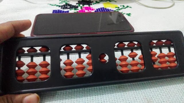 Closeup view of educational abacus used for learning mathematics and counting skills