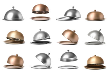Fototapeta premium Of silver and gold cloches with trays, restaurant service and fine dining presentation, a collection of silver and gold cloches with matching trays are arranged on a clean white background