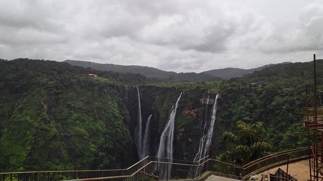 A wide view of Jog Falls showcasing cascading water and scenic natural landscape during monsoon