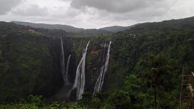 A wide view of Jog Falls showcasing cascading water and scenic natural landscape during monsoon