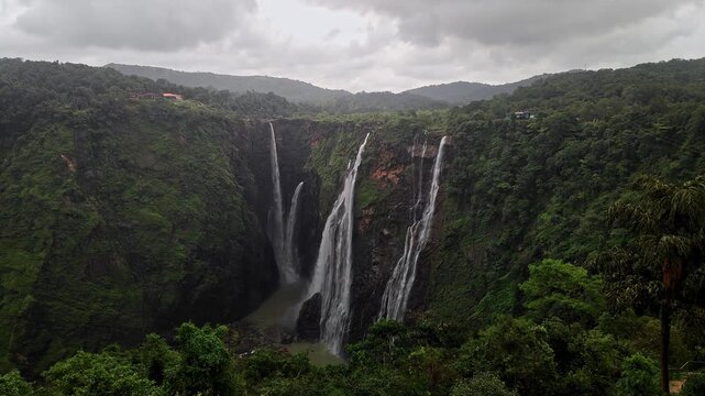A wide view of Jog Falls showcasing cascading water and scenic natural landscape during monsoon