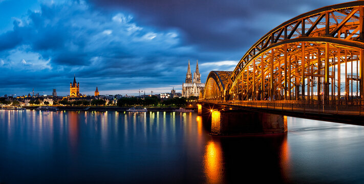 Germany, Cologne, View of Cologne Cathedral, Hohenzollern Bridge and Great Saint Martin Church with River Rhine