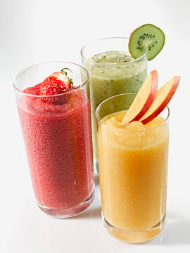 Variety of smoothie in glass on white background