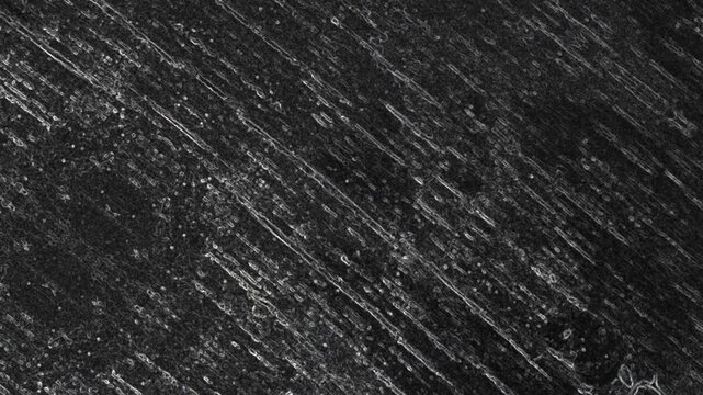 Dark scratched surface featuring diagonal streaks, rough texture, and scattered reflective particles throughout. Grunge texture background animation.